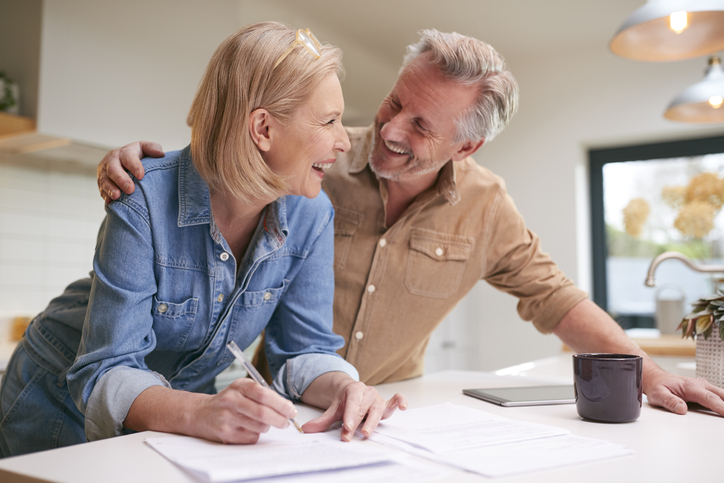 A couple relieved that they qualify for an exemption for a prohibited transaction from their self-directed IRA.