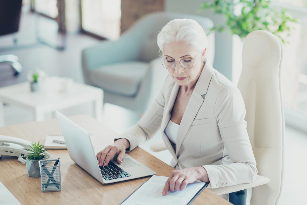 A woman reviewing her retirement plan.