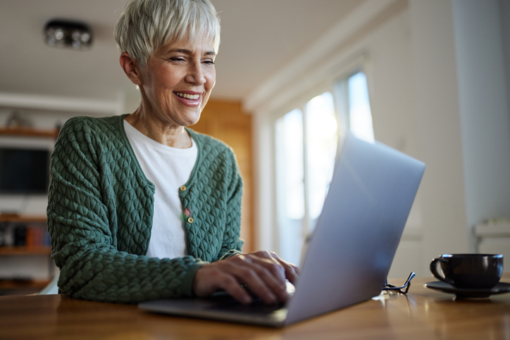 A business owner looks up the federal corporate income tax rate.