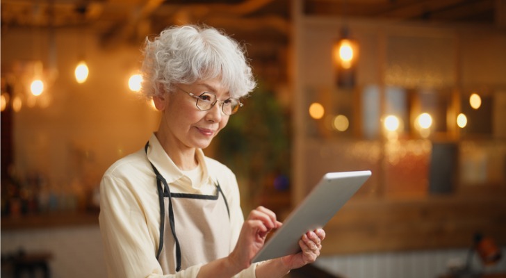 A senior reviewing her retirement plan.
