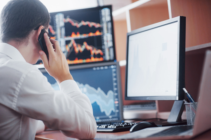 A financial advisor reviewing the account of a client.