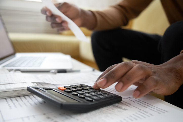 Close up of a man reviewing his retirement plan.